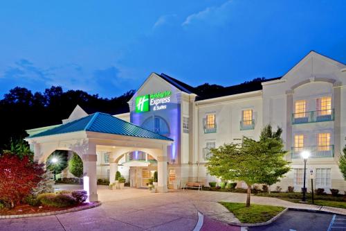 a rendering of a hotel at night at Holiday Inn Express Mount Arlington by IHG in Mount Arlington