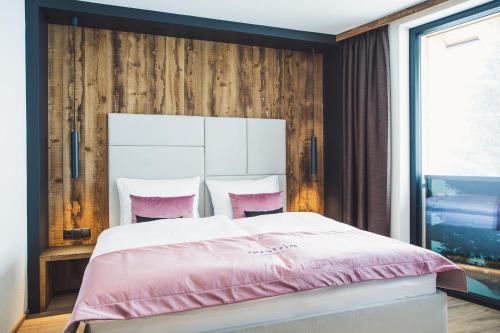 Austria Aparthotelにあるベッド