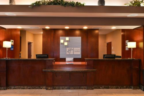 a lobby of a hotel with a reception desk at Holiday Inn Express Edmonton North by IHG in Edmonton