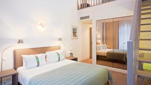 Ein Bett oder Betten in einem Zimmer der Unterkunft Holiday Inn Resort le Touquet by IHG