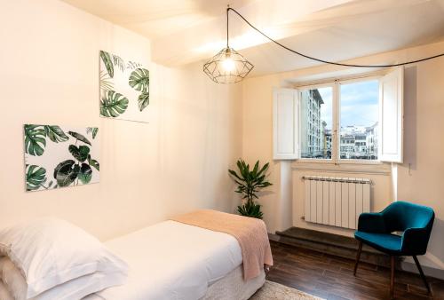 Posteľ alebo postele v izbe v ubytovaní Historic Center apartment - Next to the river, all attractions - By LikeHomeFlorence