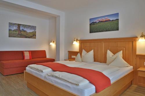 Ein Bett oder Betten in einem Zimmer der Unterkunft Frankenhof