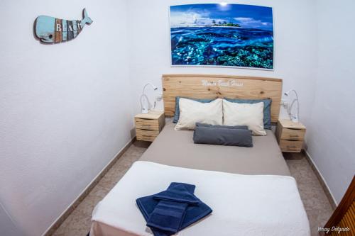 Кровать или кровати в номере Mundo Beach House, Playa San Marcos, Tenerife