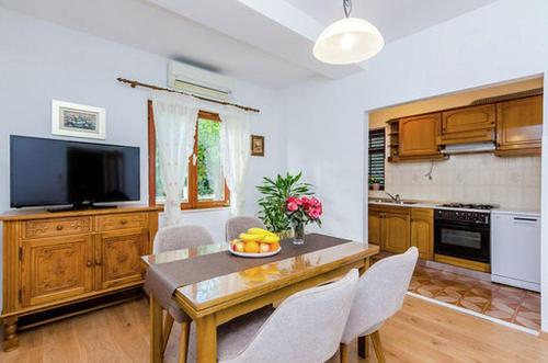 Kuchyň nebo kuchyňský kout v ubytování Antares Apartments