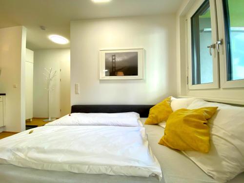 Topmodernes Sonnenwohnen Apartment bei U-Bahn und Therme Wien Oberlaa, 15 min bis Stephansplatz 객실 침대