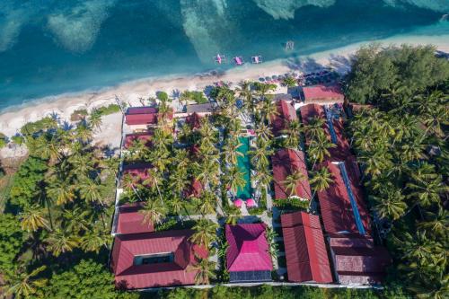 an overhead view of a resort with palm trees at PinkCoco Gili Air - for Cool Adults Only in Gili Air
