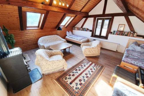 an overhead view of a living room with furniture at Ferienhaus zur alten Gärtnerei in Kirchberg am Wechsel