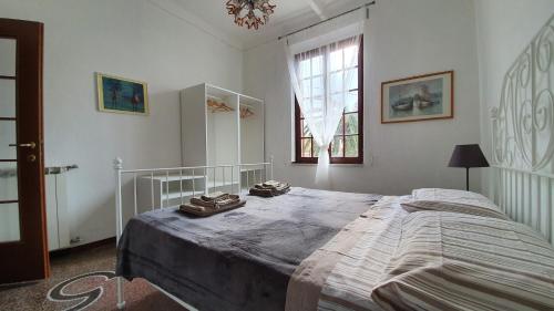 Ένα ή περισσότερα κρεβάτια σε δωμάτιο στο Casa indipendente a 200 metri dal mare