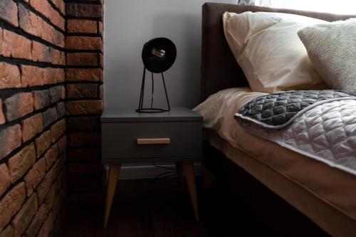 Postel nebo postele na pokoji v ubytování Apartament Wataha
