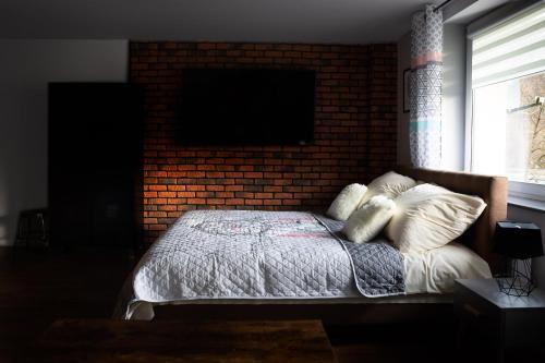 Postel nebo postele na pokoji v ubytování Apartament Wataha