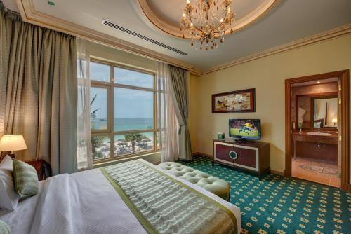 Postel nebo postele na pokoji v ubytování Sahara Beach Resort & Spa