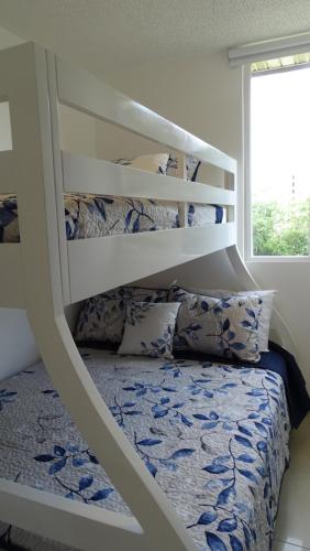 Ένα ή περισσότερα κρεβάτια σε δωμάτιο στο 3Room Penthouse Beach Condo