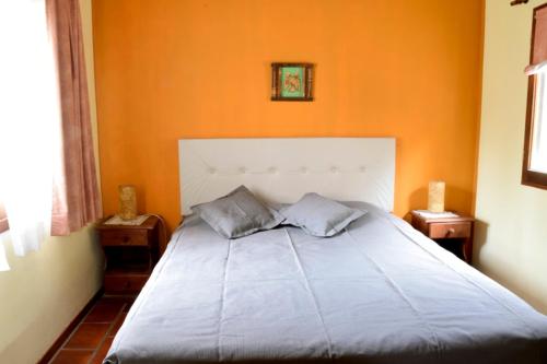 Кровать или кровати в номере Cabañas Babin Kuk