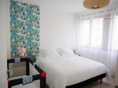 Ένα ή περισσότερα κρεβάτια σε δωμάτιο στο Superbe appartement en centre ville avec terrasse