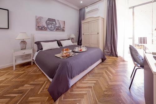 Katil atau katil-katil dalam bilik di B&B Palazzo Satriano