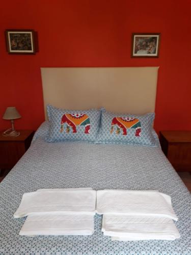 Ένα ή περισσότερα κρεβάτια σε δωμάτιο στο Galicia Accomodation