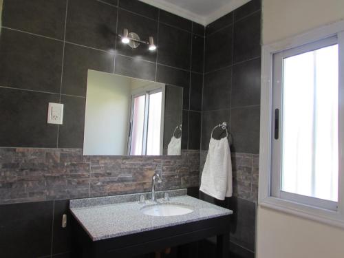 Ett badrum på Encantador Departamento en Mendoza Domaine Laborde II