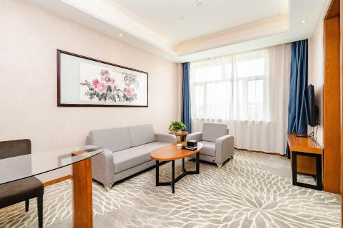 Χώρος καθιστικού στο Fu Hua International Hotel Dunhuang