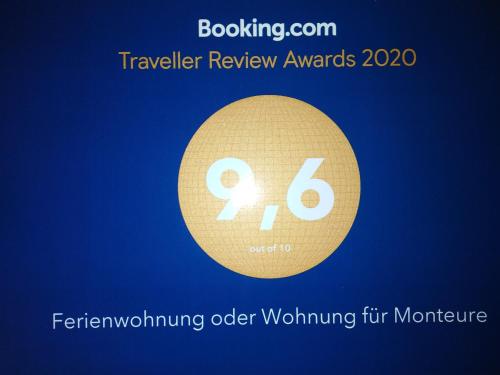 a gold circle with the words traveller review awards on it at Ferienwohnung mit kleinem Garten in Sonnenbühl