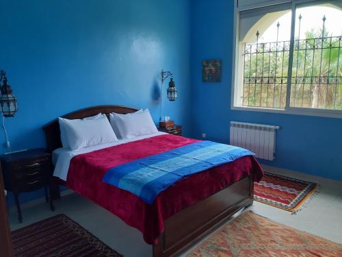 Кровать или кровати в номере Riad TANJIL