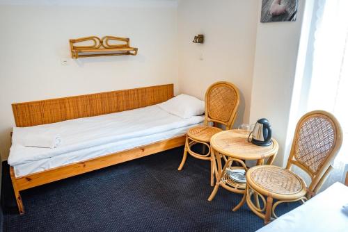 Una cama o camas en una habitación de Willa Safona