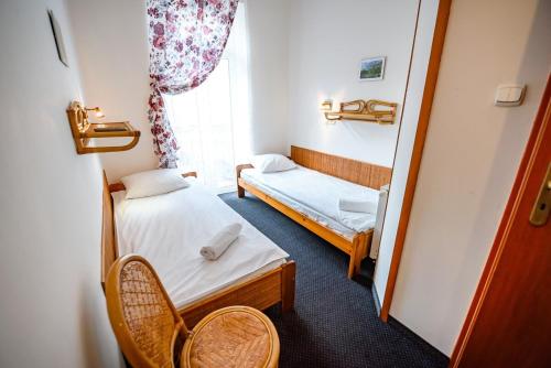 Una cama o camas en una habitación de Willa Safona