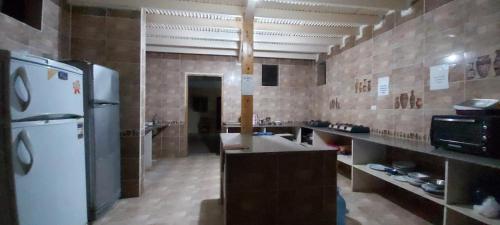 Una cocina o zona de cocina en Oasis Fighting Kangaroo