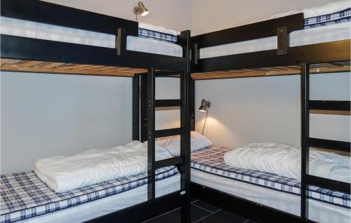 two bunk beds in a dorm room with two beds at Nice Apartment In Hemsedal With Wifi in Hemsedal