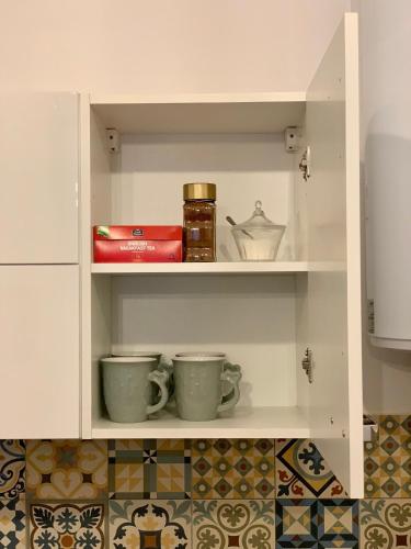 Una cocina o cocineta en Old Town Studio