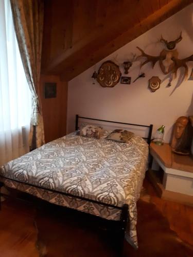 Kama o mga kama sa kuwarto sa Vila Valdonė