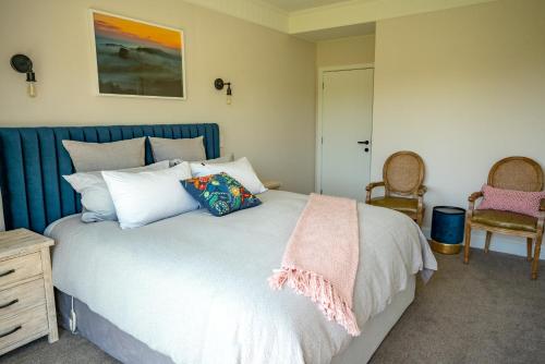 Ένα ή περισσότερα κρεβάτια σε δωμάτιο στο Kauri Glen BnB