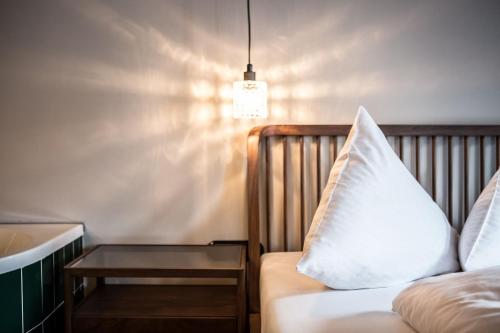 Postel nebo postele na pokoji v ubytování HOLZGAUER HAUS