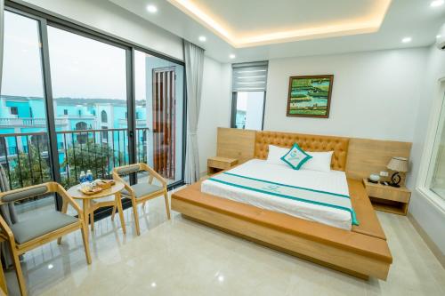 Postel nebo postele na pokoji v ubytování Green Tree Hotel Phú Quốc