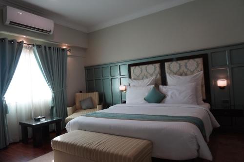 Katil atau katil-katil dalam bilik di The Reserve Boutique Hotel