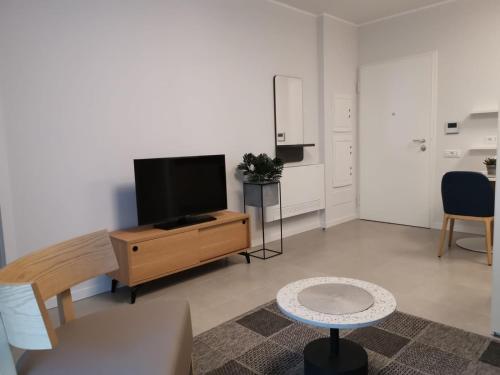 TV a/nebo společenská místnost v ubytování Domitys Quarto Verde