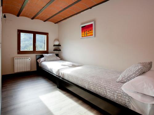 Ένα ή περισσότερα κρεβάτια σε δωμάτιο στο Mas Pinoses