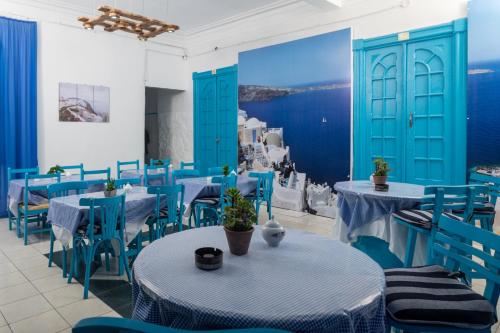 En restaurant eller et andet spisested på Acropole Hotel