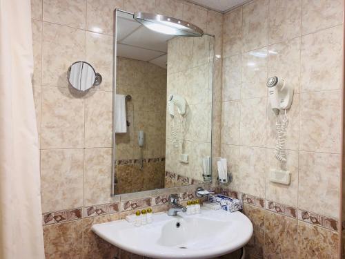 Koupelna v ubytování Slavyanka Hotel