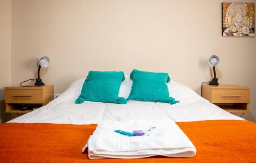CasaGrande Hotel tesisinde bir odada yatak veya yataklar