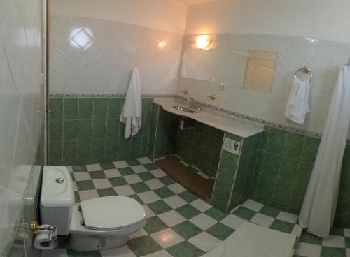 Et badeværelse på CasaGrande Hotel