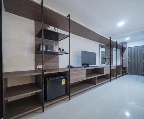 A television and/or entertainment centre at Tassana Place