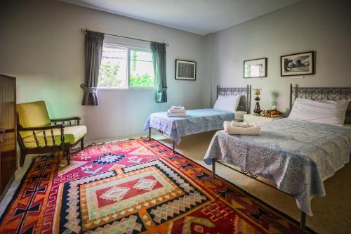 Кровать или кровати в номере Beit Al Baraka