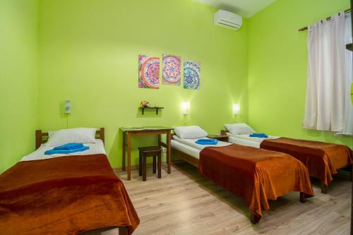 Katil atau katil-katil dalam bilik di Mini-Hotel Ocean