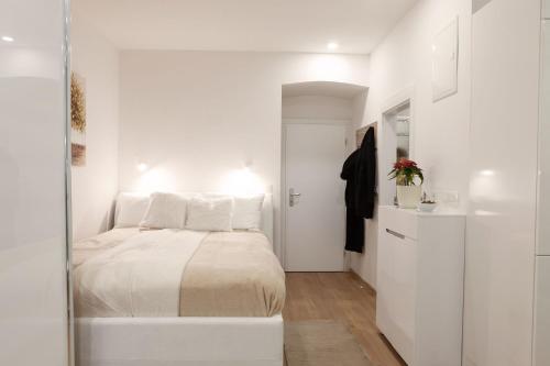 En eller flere senge i et værelse på Studio Apartment Gea Tour As Ljubljana