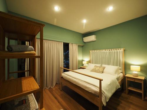A bed or beds in a room at Sophia's Penthouse Apartment With Jacuzzi and Acropolis View From Big Terrace