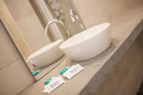 Een badkamer bij Bagu Santander Hotel