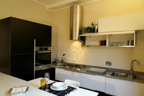 Nhà bếp/bếp nhỏ tại Pompeo Apartment