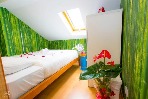 En eller flere senger på et rom på SwissLisbon Guest House