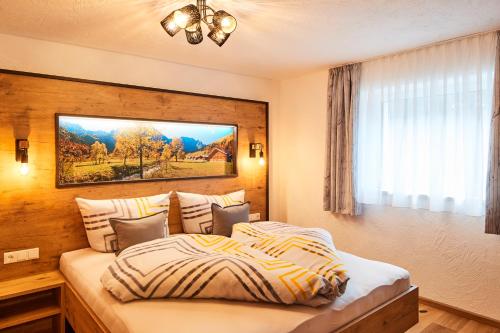מיטה או מיטות בחדר ב-Apartment Naturnah