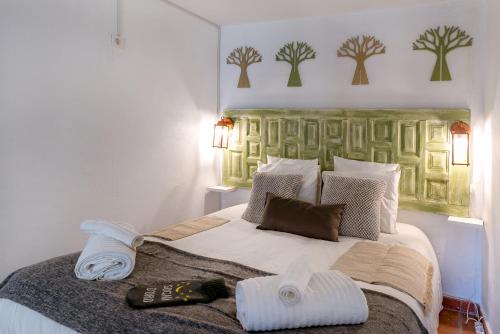 Ένα ή περισσότερα κρεβάτια σε δωμάτιο στο Casa Consuelo